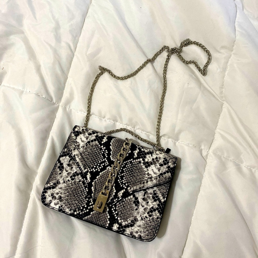 Snake print bag.